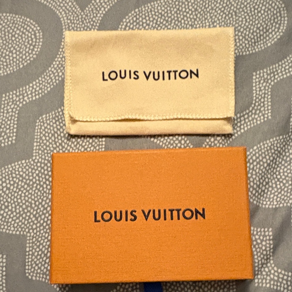 Mini Louis Vuitton Beige dust bag and mini Orange box
